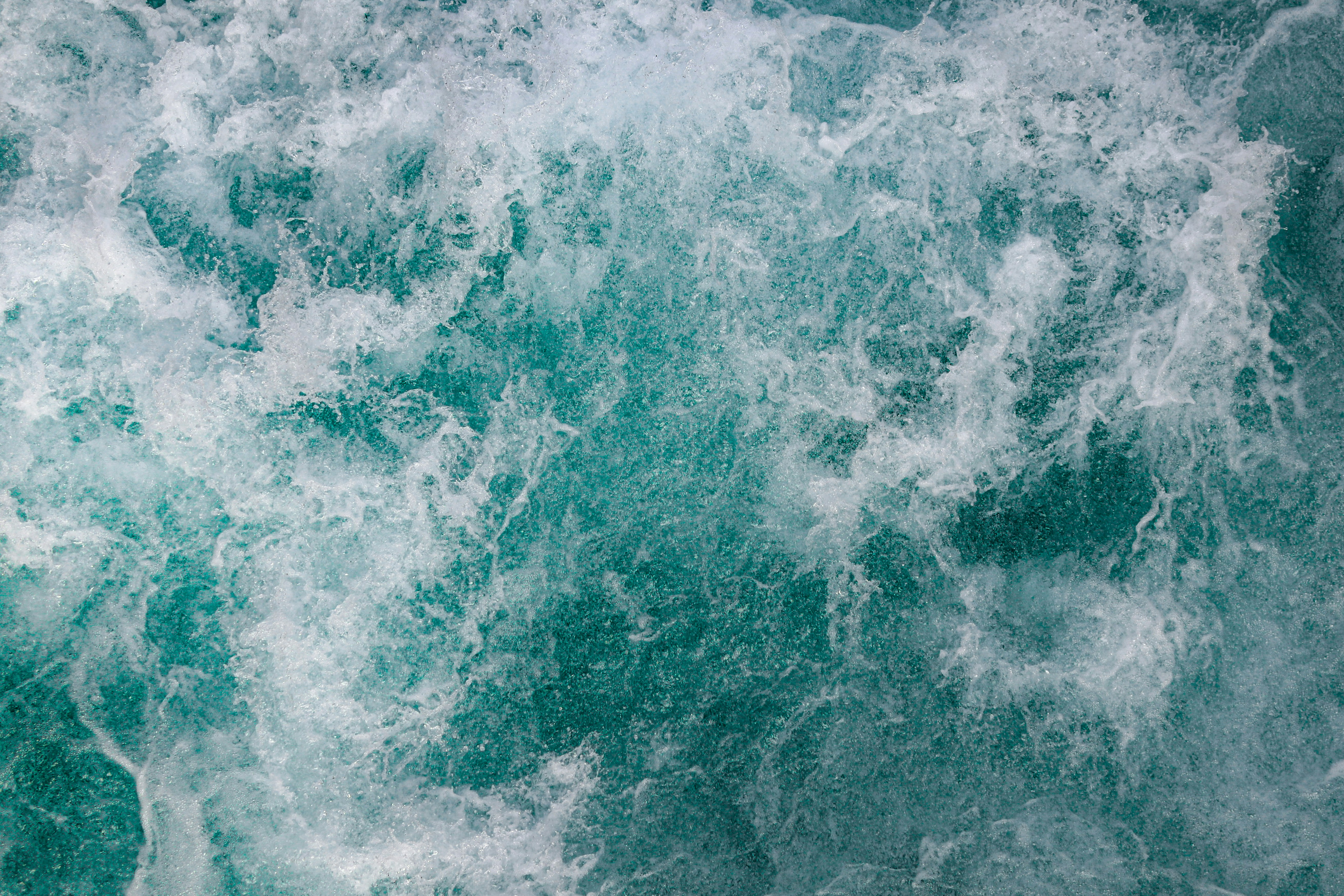 white and blue ocean waves